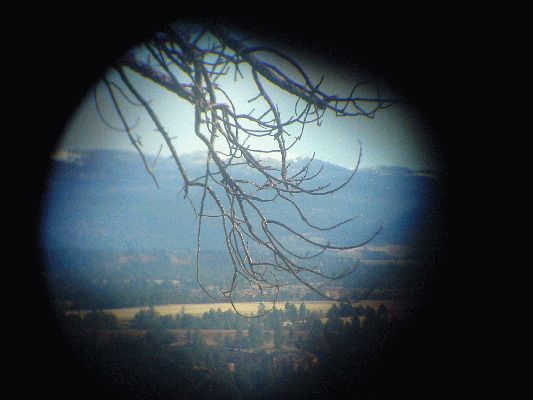 Black Hills WY, with snow through telescope
