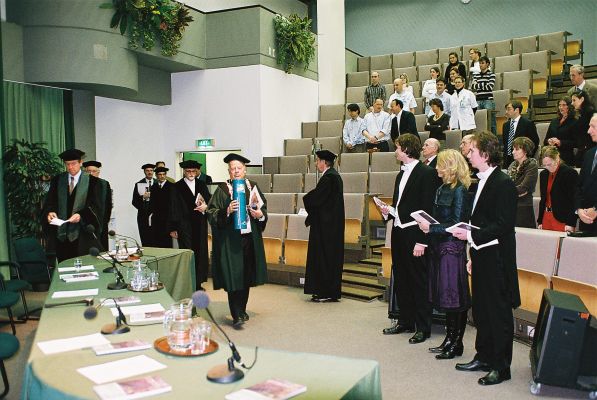The PhD Committee is entering the room with my PhD Certificate
