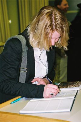 Marieke writing in the ceremony book
