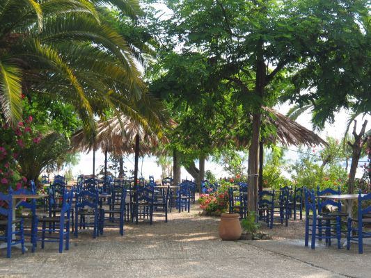 Gialova, Greece 
blue chairs on the terras
